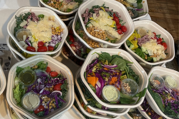 Food recovery network table of salads