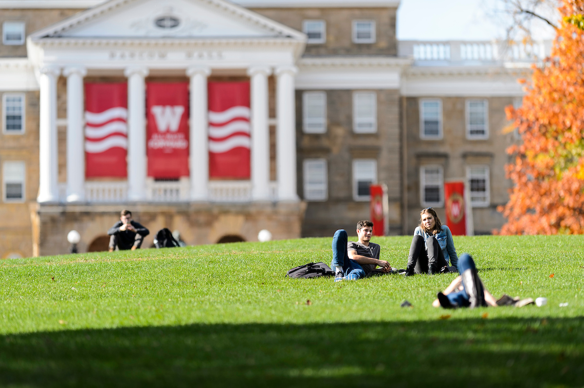 Students relax and study on Bascom Hill at the University of Wisconsin-Madison.
