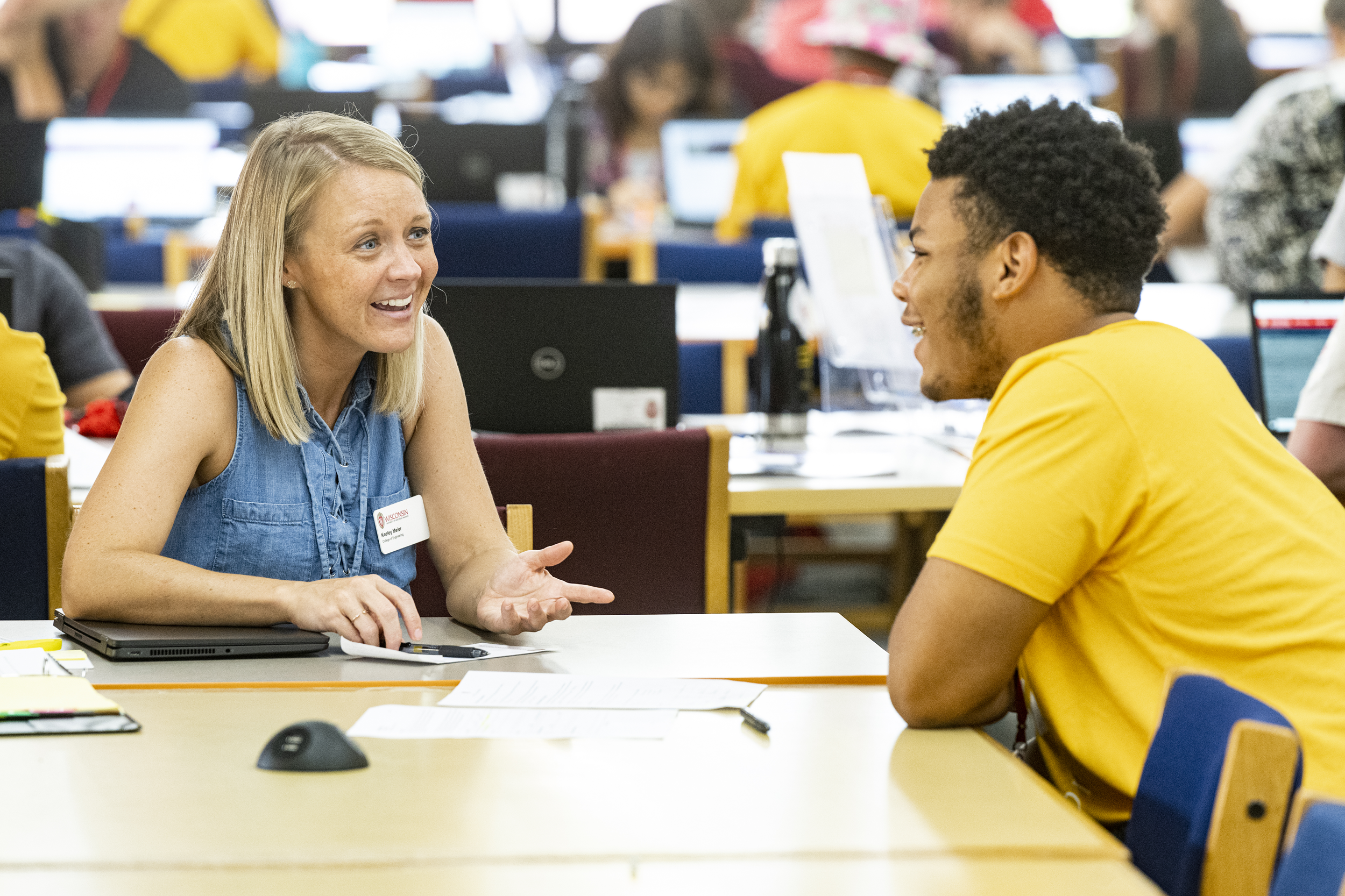 An advisor talks with a student at SOAR